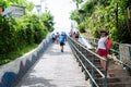 People going up and down the stairs of the entrance to Morro de Sao Paulo, Cairu, Bahia, Brazil