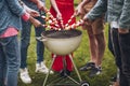 Group of people grilling shashliks Royalty Free Stock Photo