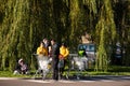 group of people with groceries full of shopping carts in LIDL supermarket parking lot