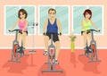 Group of people in gym, exercising their legs doing cardio training Royalty Free Stock Photo