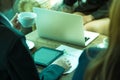 Group of people having a meeting after successful business negotiation in a coffee shop.Drinking hot beverage latte art coffee. Royalty Free Stock Photo