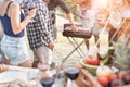 Group of people people having picnic barbecue in nature outdoor - Happy friends cooking meat and drinking wine in weekend summer Royalty Free Stock Photo