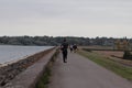 Leisure walk and cycling along a path .