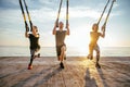 Group of people having Trx training Royalty Free Stock Photo