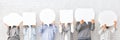 Group of people hiding faces behind blank speech bubbles Royalty Free Stock Photo