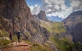 Group of people hiking in the mountains of Schlern-Rosengarten Nature Park in Italy