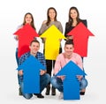 Group of people holding arrows Royalty Free Stock Photo