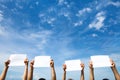 Group of people holding empty blank paper signs Royalty Free Stock Photo