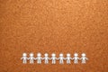 Group of people holding hands on bulletin board. Teamwork concept. Royalty Free Stock Photo