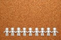 Group of people holding hands on bulletin board. Teamwork concept. Royalty Free Stock Photo