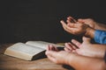 People holding hands praying worship believe Royalty Free Stock Photo