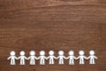 Group of people holding hands on wood. Teamwork concept. Social Network concept. Royalty Free Stock Photo