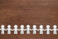 Group of people holding hands on wood. Teamwork concept. Social Network concept. Royalty Free Stock Photo