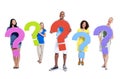 Group of people holding question marks