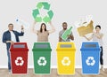 Group of people holding recycle icons Royalty Free Stock Photo
