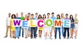 Group of People Holding Word Welcome Royalty Free Stock Photo