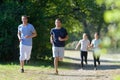 Group people jogging in park Royalty Free Stock Photo