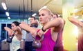 Group of people with kettlebells exercising in gym Royalty Free Stock Photo