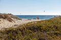 a group of people kite surfing