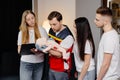 Group of people learning how to make first aid with dummy child during the training indoors Royalty Free Stock Photo