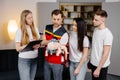 Group of people learning how to make first aid with dummy child during the training indoors Royalty Free Stock Photo