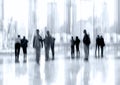 Group of people in the lobby business center and blue tonality Royalty Free Stock Photo