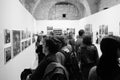 Group of people look at the artwork in Maison Europeenne de la Photographie museum in Paris, France