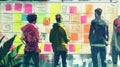 A group of people are looking at a wall of sticky notes The sticky notes are different colors and sizes The people are Royalty Free Stock Photo