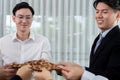 Group of people making chain of gears into collective form for harmony symbol. Royalty Free Stock Photo