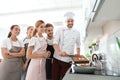 Group of people and male chef
