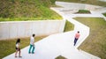 Group of people are in the maze near the Rezeknes castle ruins