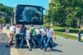 Group of people men pushing the broken bus on a country road to start the engine. Moravia Czech republic