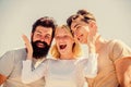 Group of people outdoor. heaven concept. success heights. happy woman and two men. cheerful friends. friendship Royalty Free Stock Photo