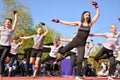 Dynamic Piloxing Class: A Fusion of Boxing, Pilates, and Dancing in a Vibrant Public Park Setting