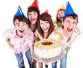 Group of people in party hat with cake. Royalty Free Stock Photo