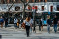 Group of people on pedestrian crossing. New situation in Spain about the pandemic of Covid-19. People are using mask in their new