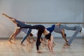 Group of people performing stretching exercise