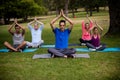 Group of people performing yoga Royalty Free Stock Photo