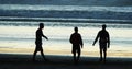 Group of People playing Football on Cabourg Beach at Sunset, Normandy