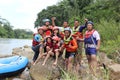 Group of people playing rafting on a river that has a heavy flow, Royalty Free Stock Photo