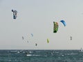 Group of people practicing kitesurf