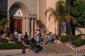 Group of people praying outside closed Church in Los Angeles