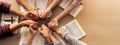 Group of people praying together while holding hand. Top view. Burgeoning. Royalty Free Stock Photo