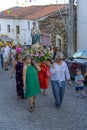 group of people in procession in honor of Santo Domingo promoted by the parish of the Portuguese village of Malpica do Tejo