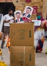 Group of people protesting for boycott chinese products and services and burning photos of Xi Jinping