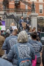 Group of people protesting for social equity and affordable housing in the streets of Boston, USA