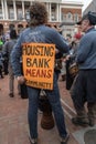 Group of people protesting for social equity and affordable housing in the streets of Boston, USA