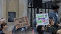 Group of people protesting for social equity and affordable housing in the streets of Boston, USA