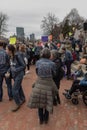 Group of people protesting for social equity and affordable housing in the streets of Boston, USA
