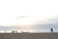 Group of people on public beach over sunset sky in Olhon, Baikal, Royalty Free Stock Photo